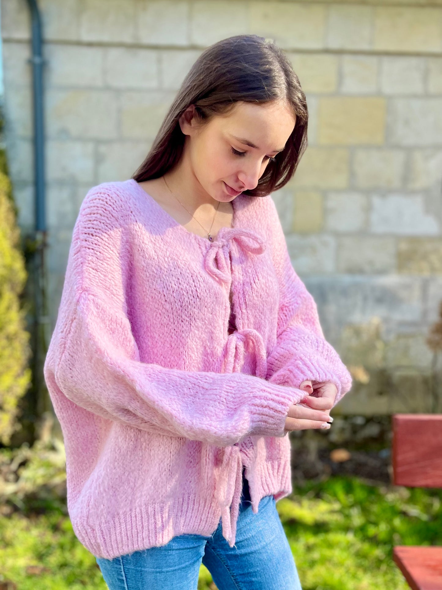 Gilet en laine avec noeud - rose pale