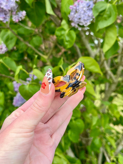 Petite pince papillon - jaune et noir